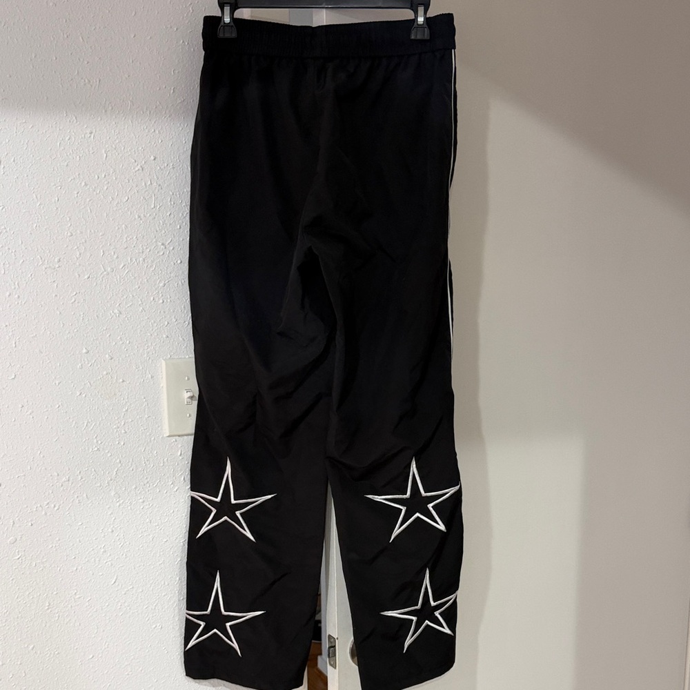 Black Pants with White Star Accents